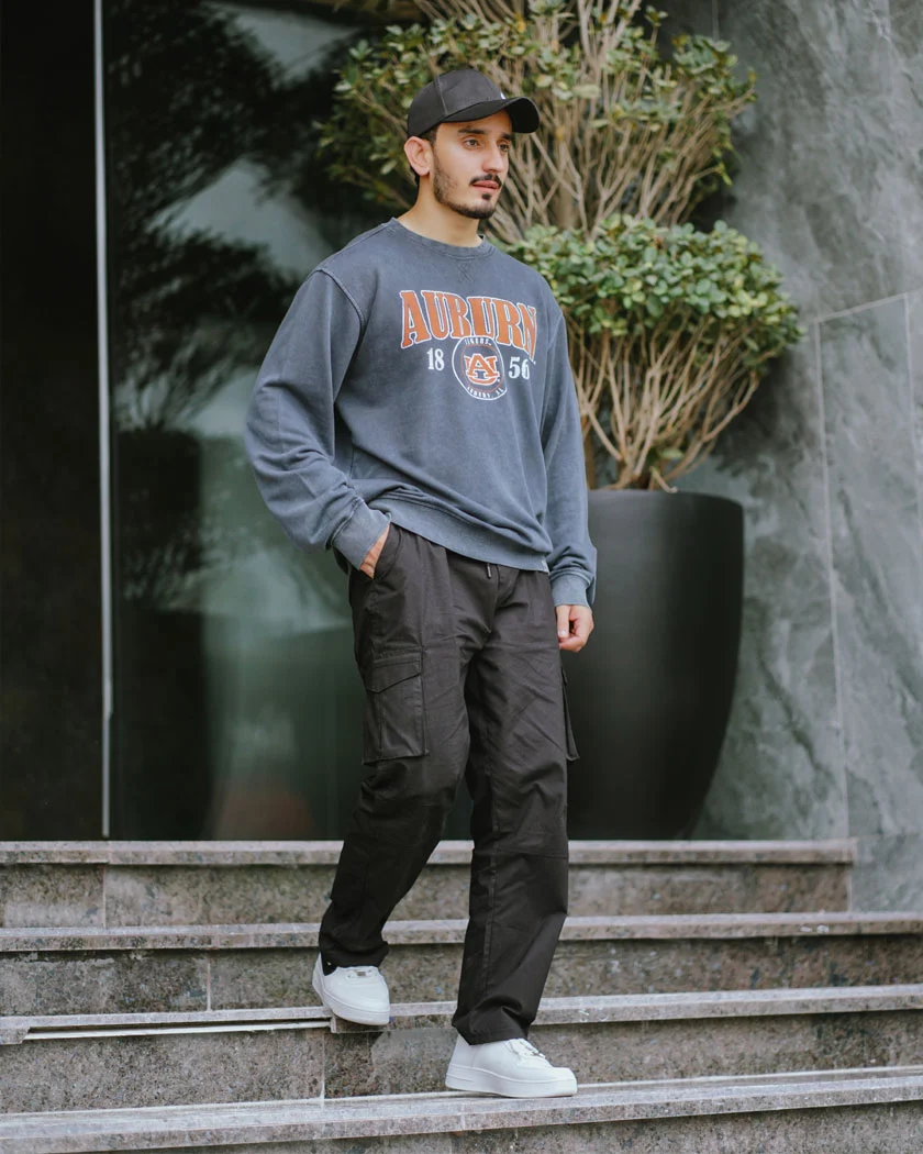 Knitworks grey sweatshirt with black cargo pants
